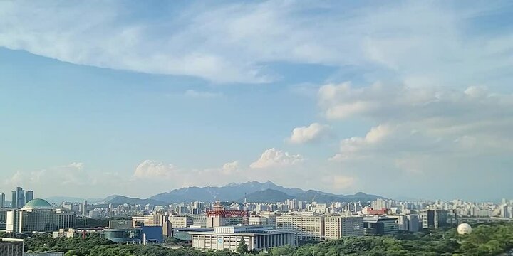 cloudscape, with a cityscape of Yeouido, Seoul, Korea, time lapse of beautiful blue sky with white clouds during sunset, for background