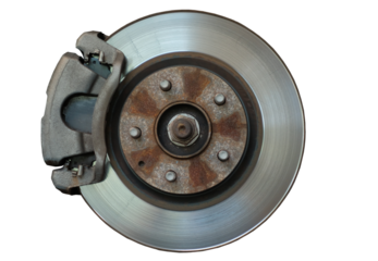 Close-Up of Car Brake Disc and Caliper in Auto Repair Shop Vehicle Maintenance