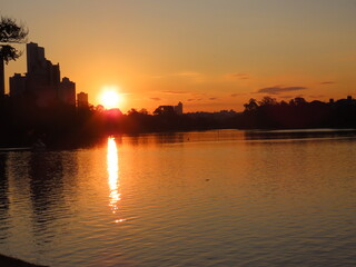 Naklejka premium sunset over the river