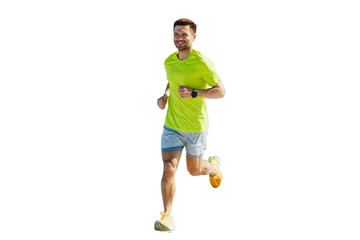 Male runner in running shoes training in a sports T-shirt, cut out