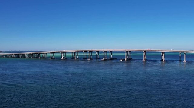 Drone flying towards the Marler Bridge in Destin, Florida.