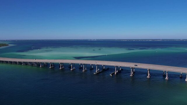 Flight over the scenic Marler Bridge in Destin, Florida, capturing breathtaking views.