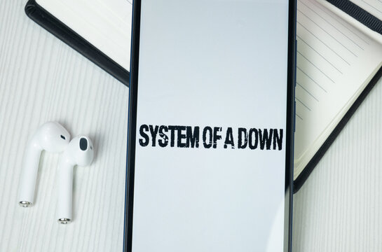 New York, USA - 30 June 2024: System of a Down Logo or Icon on Phone Screen