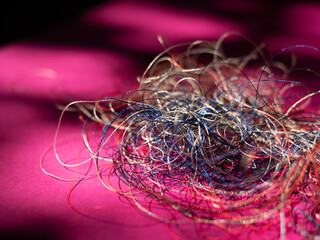Chaotically tangled threads. Embroidery threads randomly woven. Huge knot. Extreme macro. Beautiful story for intro. Title credits. Abstract screensaver. Handicraft concept, entropy, disorder measure