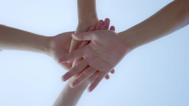 Low angle view of group hand people joining for cooperation success business, teamwork join hand together, Volunteer charity work