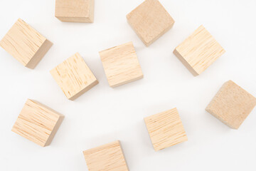 Wooden cube or wooden blocks on isolated background. Pile of wood block. Copy, empty space for text.