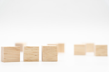 Wooden cube or wooden blocks on isolated background. Pile of wood block. Copy, empty space for text.