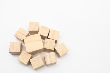Wooden cube or wooden blocks on isolated background. Pile of wood block. Copy, empty space for text.