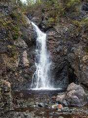 The Copper Mine Falls, located near York Harbour in Newfoundland, Canada, are conveniently accessible via a brief walk from Route 450, also referred to as Captain Cook's Trail.