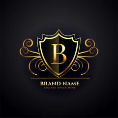 golden initial letter B logo on ornamented dark background design