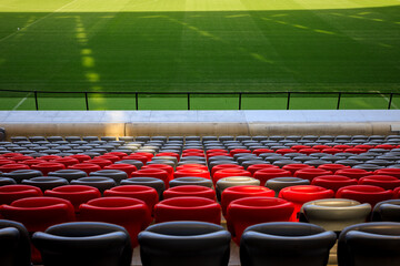 Naklejka premium stadium full of empty seats with a red and gray design