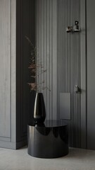 Grey wall panels and a black side table in minimalistic interior design composition.

