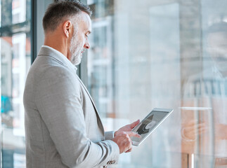 Business man, tablet and website for planning in office, sales and online for market research....