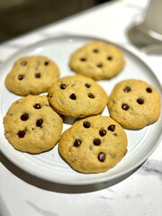 chocolate chip cookies on the white plate