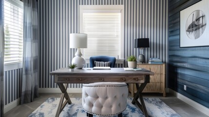 Get inspired and get to work in this graphic home office complete with a trendy striped wallpaper and chic desk furniture.
