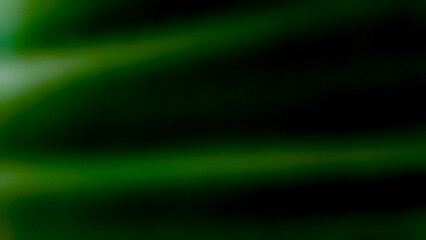 Black background with green light