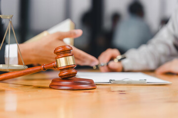 Lawyer advises client signing divorce policy document, highlighting legal consultation and agreement process.