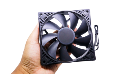 A black computer cooling fan held in a hand, isolated on a white background. Close up view of Computer Cooling Fan in a man's Hand.