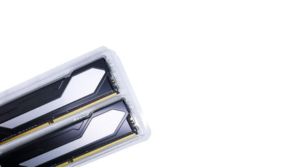 Two pieces of black RAM with silver list design in transparent plastic tray packaging. Close up of Twin Random Access Memory isolated on a white background.