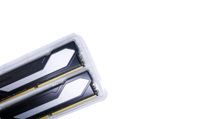Two pieces of black RAM with silver list design in transparent plastic tray packaging. Close up of Twin Random Access Memory isolated on a white background.