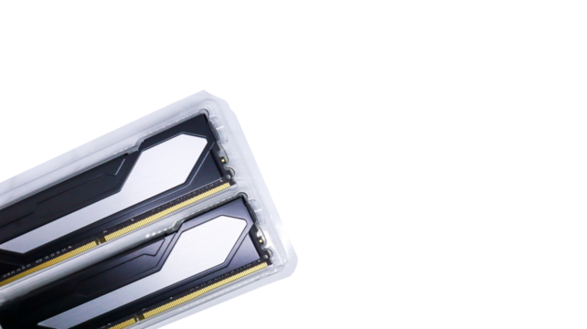 Two pieces of black RAM with silver list design in transparent plastic tray packaging. Close up of Twin Random Access Memory isolated on a white background.