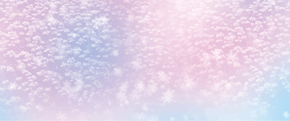 White snowflakes and frost on a light blurred background. Winter abstract background	