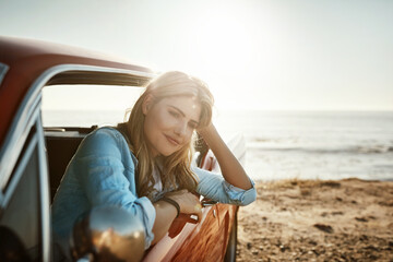 Woman, car and relax for summer travel adventure, ocean vacation and road trip for weekend break. Girl, motor transport and happy for coastal holiday with wellness, outdoor journey and stop for rest