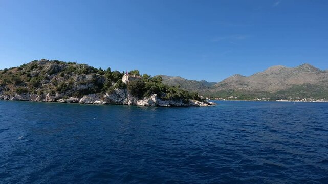 Sailing with the ship in Slano bay in Croatia