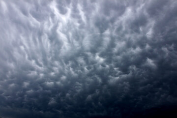Ominous clouds precede the strong winds of a thunderstorm over Illinois