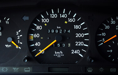 Fototapeta premium Old car speedometer with high mileage. Dashboard of oldschool car. Old car dashboard.