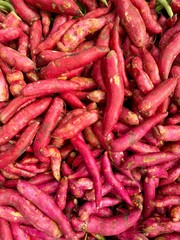 Natural pattern of organic sweet potatoes. Red potatoes vegetable background. Healthy plant food