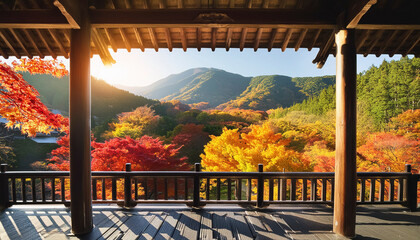 Fototapeta premium 木造のテラス・縁側から望む秋の美しい紅葉の山々と森林の風景背景素材 日本の季節・旅行・アウトドア・観光のイメージ 秋の空と雲雄大な風景