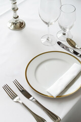 Elegant table setting waiting for food to be served at the restaurant