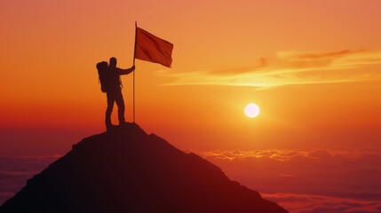 Silhouette of a climber holding a flag atop a mountain peak during a vibrant sunset, symbolizing achievement and triumph in nature.