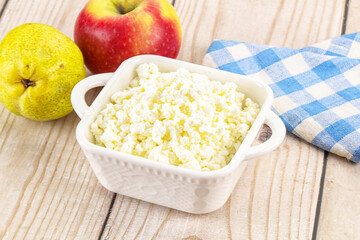 Organic cottage cheese in the bowl