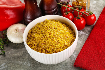 Dry wheat bulgur cereal heap