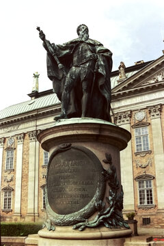 Close-up of bronze sculpture of Gustavo Erici (Gustav Vasa) in front of historic building named Riddarhuset at Swedish City of Stockholm on a summer day. Photo taken summer 1991, Stockholm, Sweden.