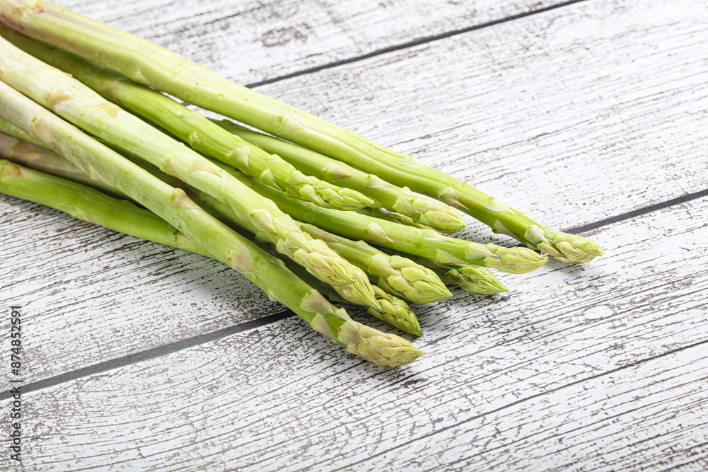 Wall mural raw green uncooked asparagus sprout