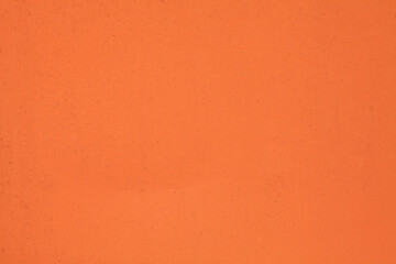 Metallic wall background, texture. Orange or red smooth but unevenly painted surface. The wall and fence sketches. Bright but dark, dingy and gloomy colors. Quick and careless paint application