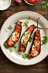 Roasted aubergine with yogurt and tomato sauce dressing
