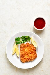 Homemade breaded chicken schnitzel
