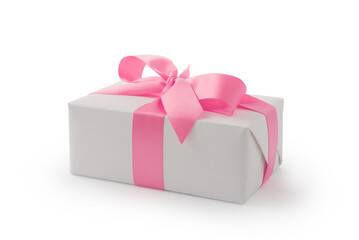 White gift box with pink ribbon bow isolated on white background