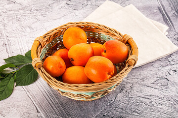 Raw ripe sweet apricots heap