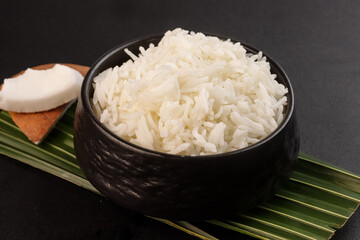 Coconut Rice is Rice Cooked in Coconut Milk. 