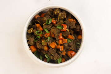 Bopis is a Traditional Filipino Dish Made From Beef Lungs and Heart Sauteed with Chilli, Tomatoes and Carrot.