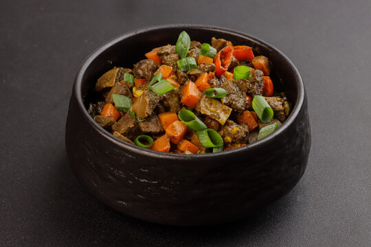 Bopis is a Traditional Filipino Dish Made From Beef Lungs and Heart Sauteed with Chilli, Tomatoes and Carrot.