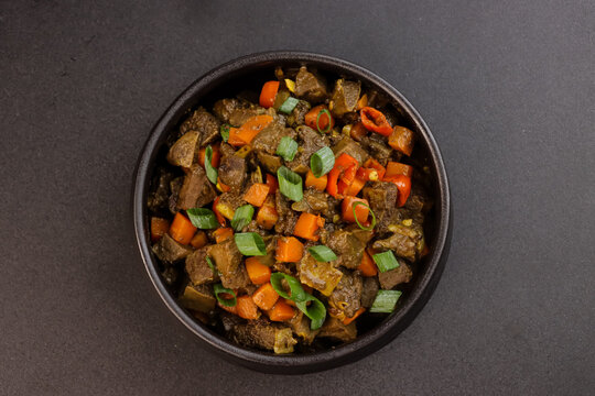 Bopis is a Traditional Filipino Dish Made From Beef Lungs and Heart Sauteed with Chilli, Tomatoes and Carrot.