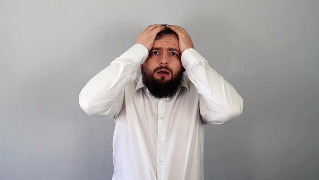 Surprised man in shock and stress grabs his head, Asking What? OMG! Epic Fail, Frustration, confusion, fiasco