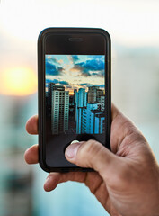 Person, mobile phone and screen with city for photography, urban view and smartphone display for digital image. Hands, closeup and pov of travel photo for memory, social media post and personal blog.