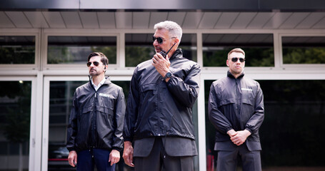 Experienced security guard leading a team of bodyguards to ensure the safety